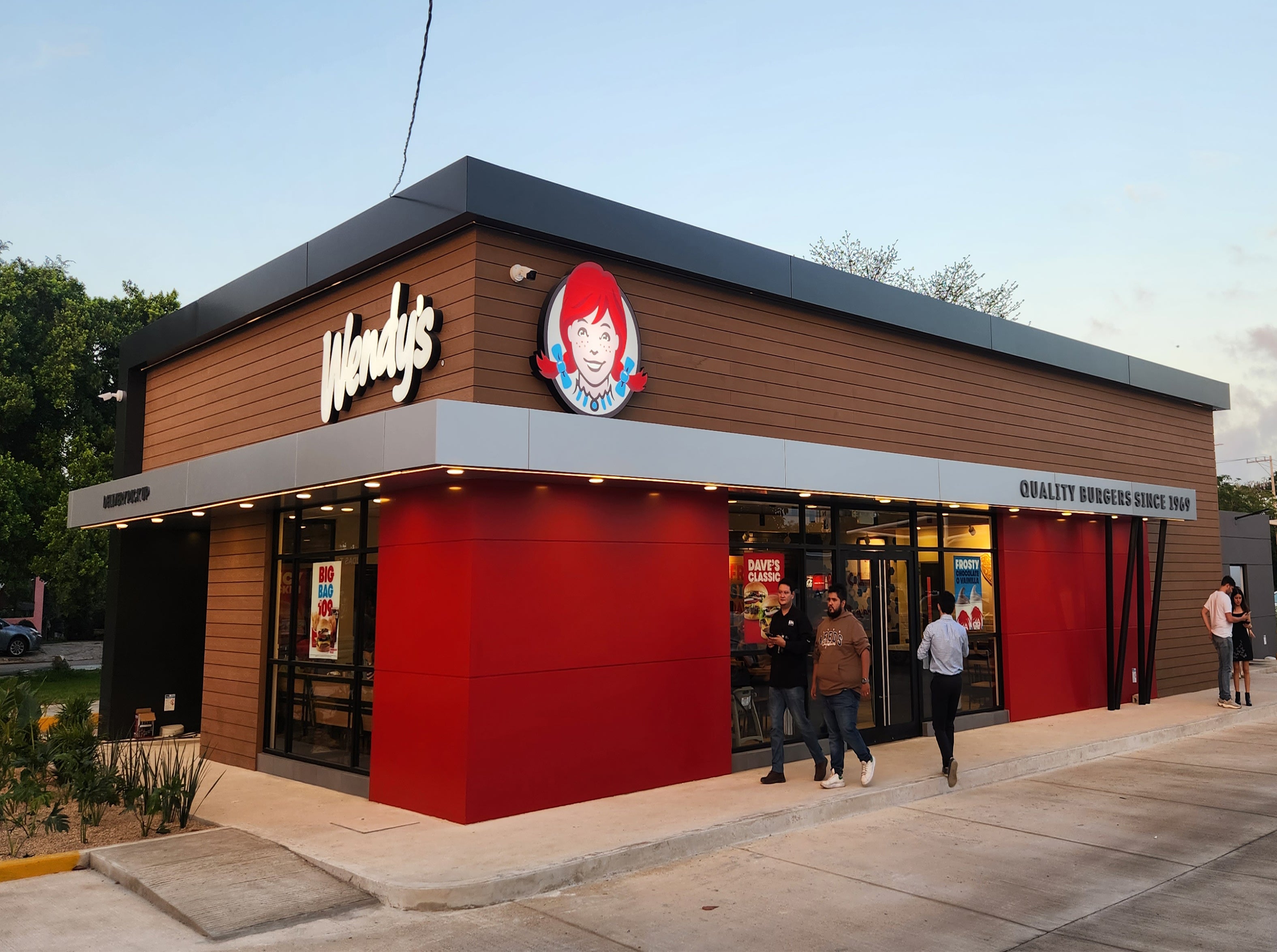 Opening Day outside of Wendy's in Merida, Yucatan with customers walking around