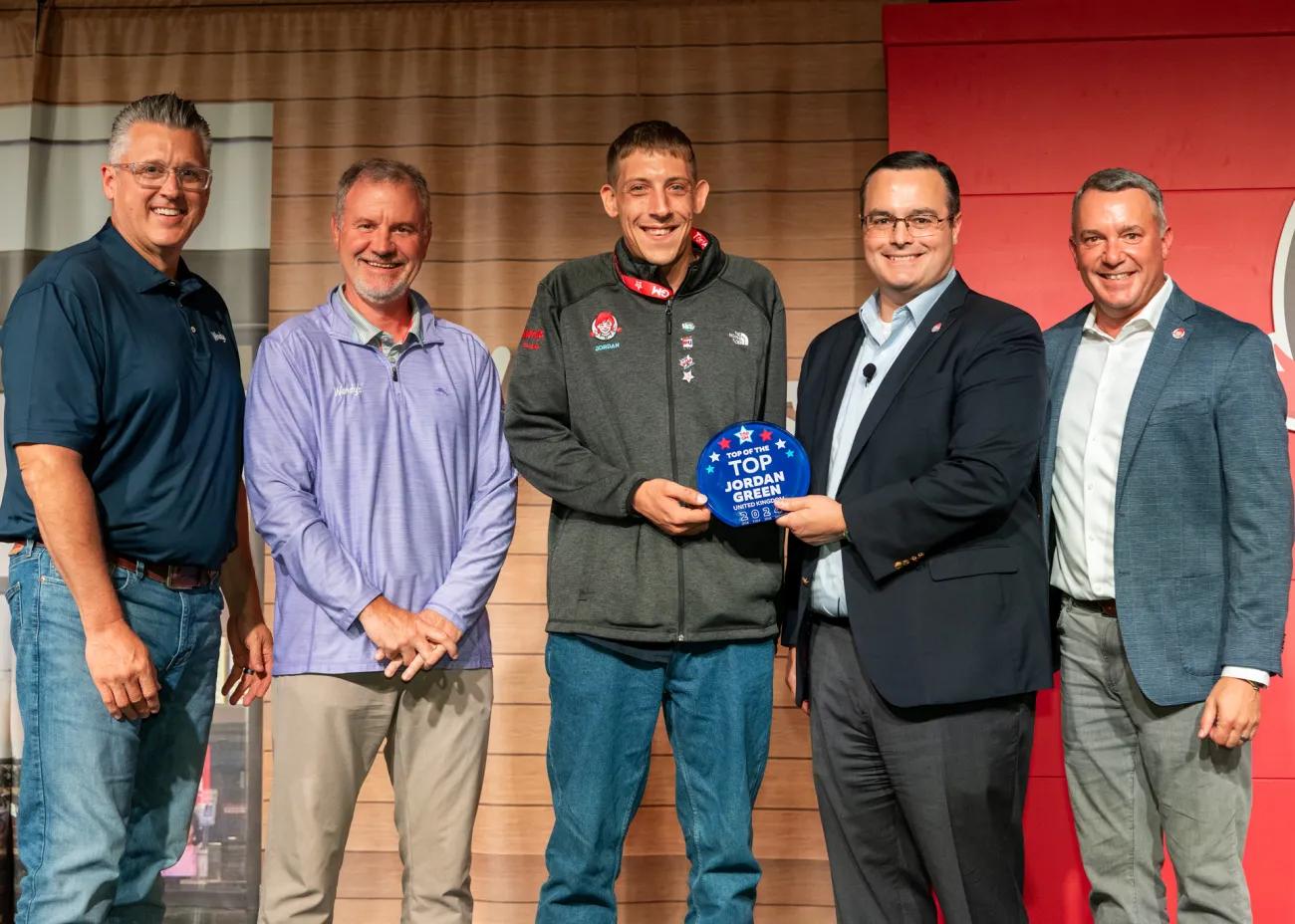 Wendy's Top GM, Jordan Green, with Company leadership